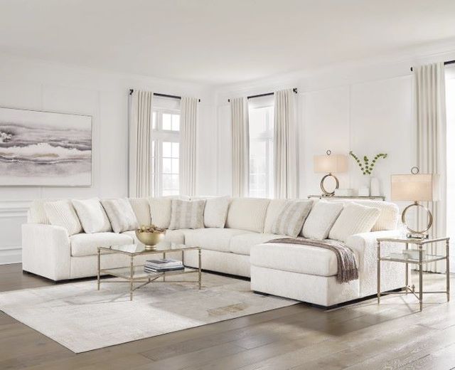 Signature Design by Ashley® Chessington 4-Piece Ivory Right-Arm Facing Sectional and Chaise-1