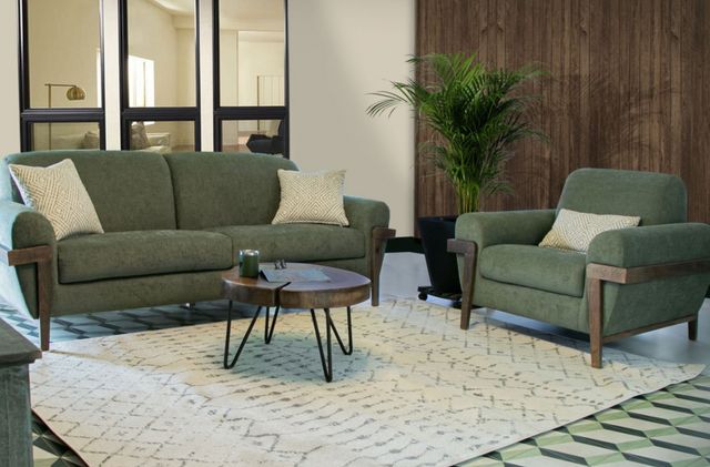 front view of the International Furniture Direct Loft Brown Olive Green Sofa in a modern office waiting room space with a matching accent chair