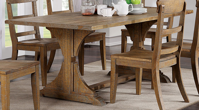 front view of the Furniture of America® Leonidas Natural Tone Dining Table in a modern dining room, styled with a tea set on top
