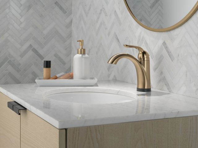 Delta Lahara® Champagne Bronze Touch2O® Bathroom Faucet with Touchless Technology with Drain-1