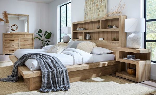 Platform bed frame featuring sliding storage drawers Platform bed frame featuring sliding storage drawers
