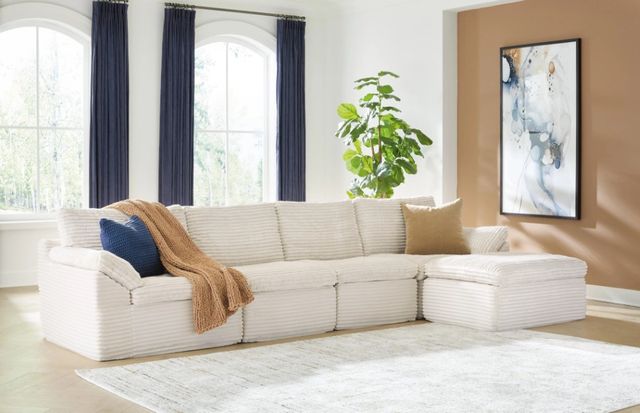 Signature Design by Ashley® Canefield 4-Piece Ivory Modular Sectional with Ottoman-2
