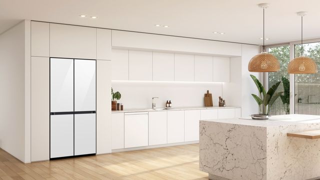 Front view of a modern luxury kitchen with a white Samsung bespoke four door refrigerator