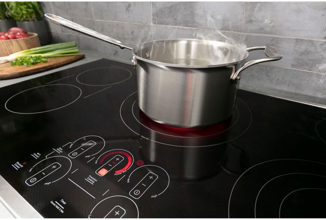 GE Profile™ 30" Black Built-In Electric Cooktop-6
