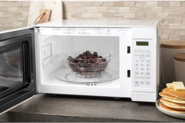 GE® 0.7 Cu. Ft. White Countertop Microwave-4