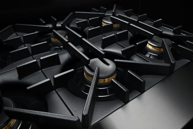 Close view of the JennAir dual fuel range grates