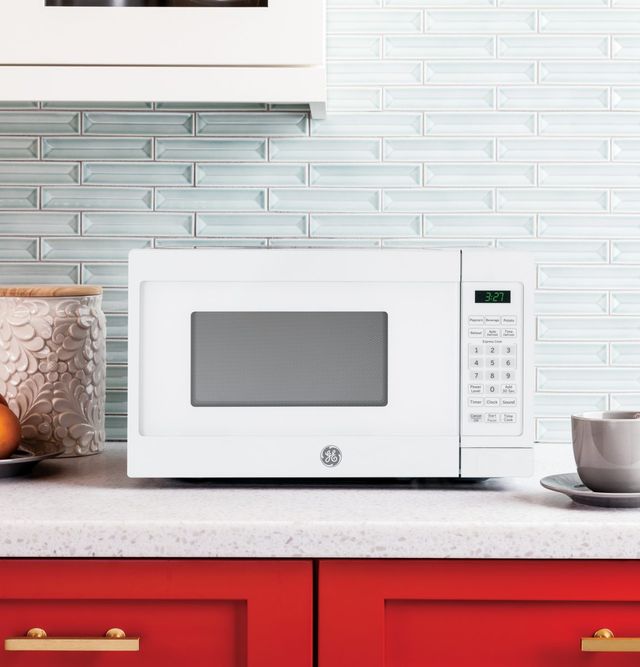 GE® 0.7 Cu. Ft. White Countertop Microwave-4