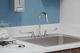 Elkay Chrome 8" Centerset Concealed Deck Faucet with 5" Gooseneck Spout and 6" Wristblade Handles-1