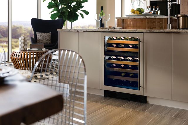 Front view of a modern kitchen with an under counter wine fridge in an island