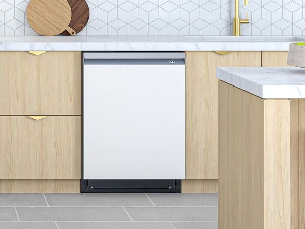 Samsung dishwasher with its door open Samsung dishwasher with its door open