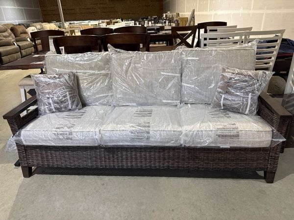 Clearance Signature Design by Ashley® Paradise Trail Medium Brown Aluminum/Resin Wicker Outdoor Sofa with Cushion-0