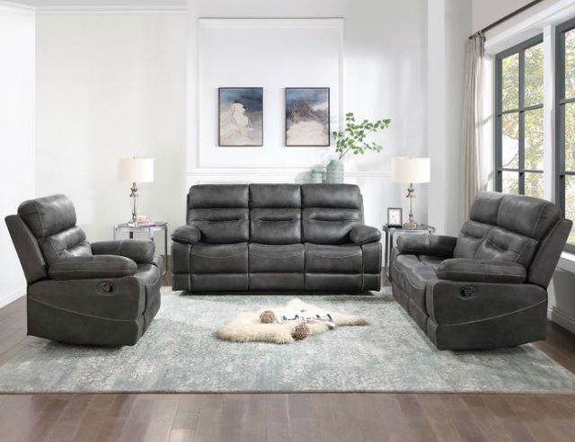 Front view of a modern living room with a recliner, sofa, and loveseat set