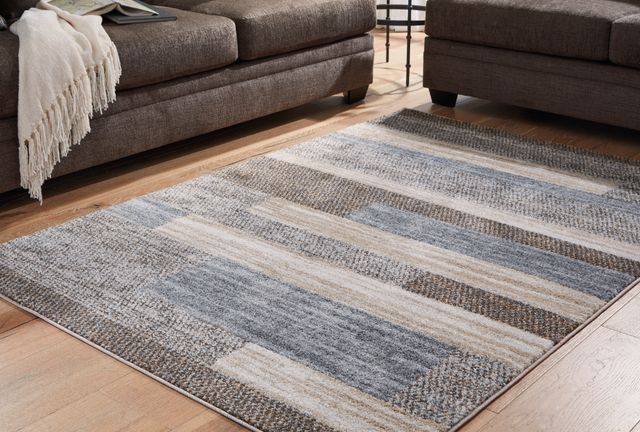 Signature Design by Ashley® Sethburn Brown/Cream/Gray 5'x7' Area Rug-1