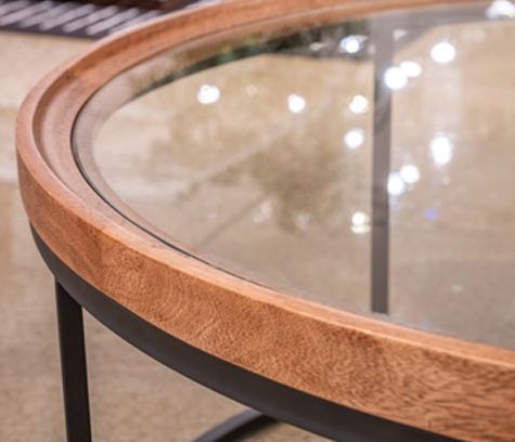 Signature Design by Ashley® Noraluna Glass Top Round Cocktail Table with Matte Black Base-1