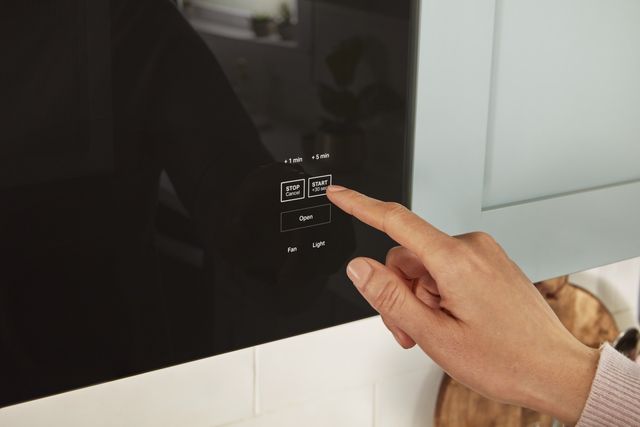 Whirlpool® 1.1 Cu. Ft. Black Over The Range Microwave-4