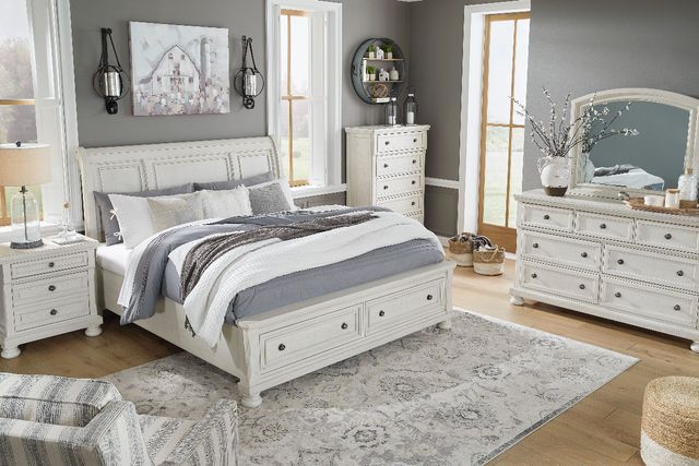 Front view of a modern transitional bedroom with a full-size bed frame 