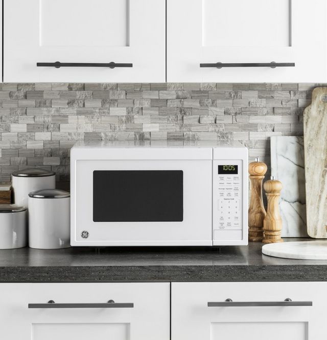 GE® 0.9 Cu. Ft. White Countertop Microwave-7