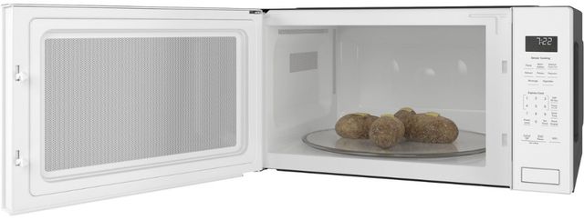 GE Profile™ 2.2 Cu. Ft. White Built In Microwave-2
