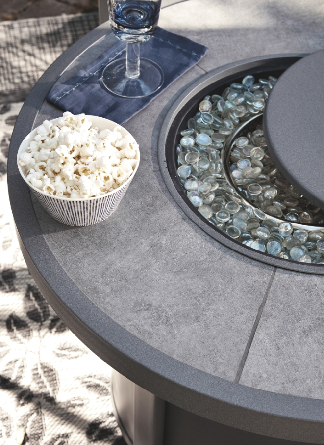 Signature Design by Ashley Donnalee Bay Dark Gray Round Fire Pit Table Cole s Appliance Home Furnishings