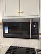 Café™ 1.7 Cu. Ft. Matte Black Over The Range Microwave-0