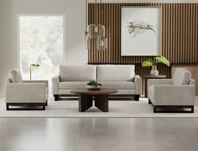 front view of a contemporary living room with a grey sofa and two matching accent chairs