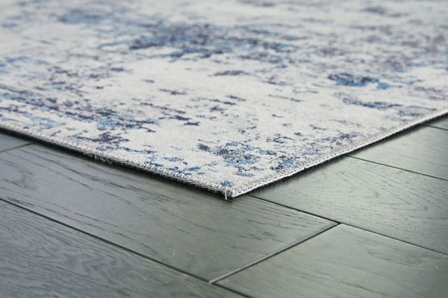 Signature Design by Ashley® Putmins Multi 5'x7' Medium Area Rug-1
