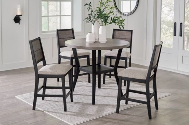 front view of a small round modern dining room set in a modern home