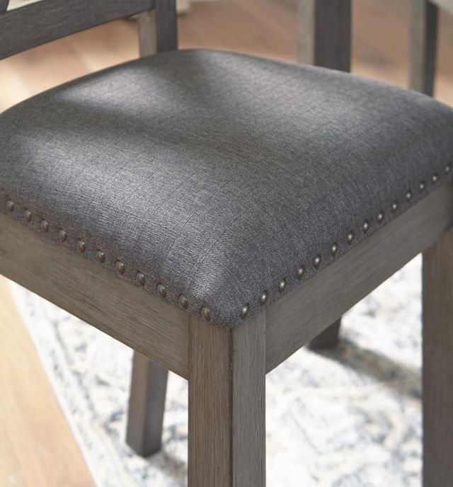 Dining table with mixed materials and upholstered chairs Dining table with mixed materials and upholstered chairs