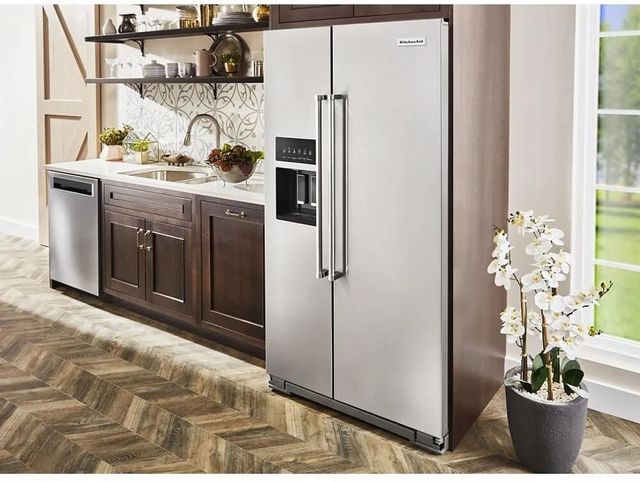 front view of a modern kitchen with a KitchenAid side-by-side counter depth refrigerator