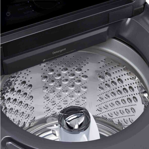 Top load washer in modern laundry room
