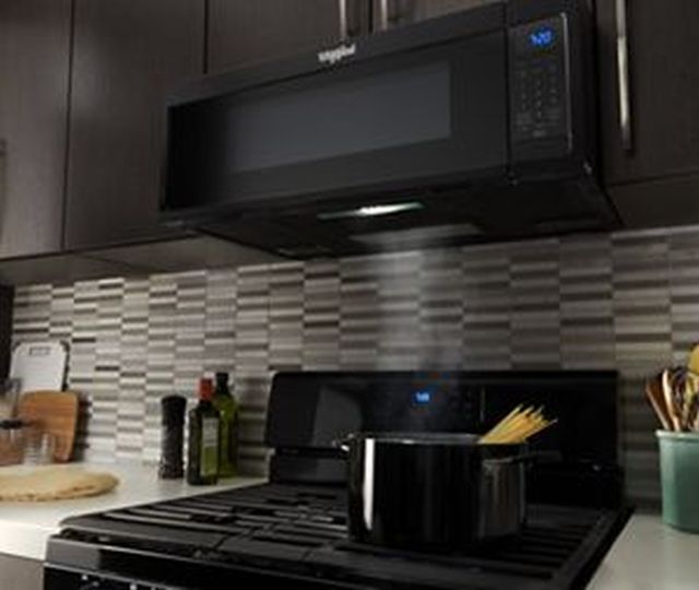 Whirlpool® 1.1 Cu. Ft. Black Low Profile Over The Range Microwave-4
