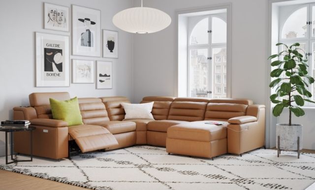Front view of a modern living room with a leather reclining sectional