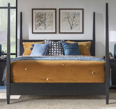 front view of the Legacy Classic Today's Traditions Blacksmith King Poster Bed in a modern bedroom