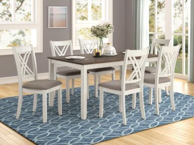 front view of the Coaster® Fortress 7-Piece Chestnut/Vintage White Dining Set in a modern dining room