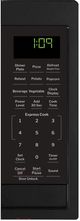 GE® 0.9 Cu. Ft. Black Countertop Microwave-1