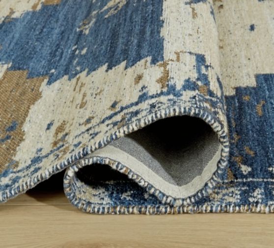 Signature Design by Ashley® Varnler Blue/Brown/Tan 5'x7' Area Rug-1