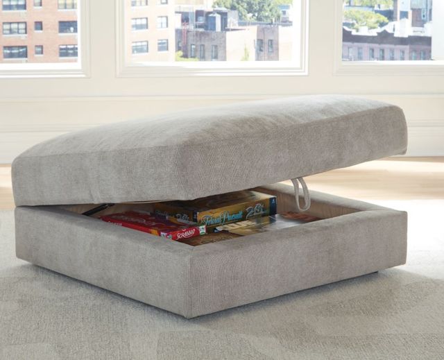 Multifunctional storage ottoman in a cozy room