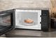 GE® 0.7 Cu. Ft. Black Countertop Microwave-1
