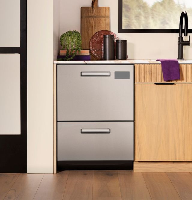 Front view of a modern kitchen with a stainless steel Fisher and Paykel double drawer dishwasher
