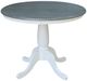 John Thomas Furniture® Dining Essentials Heather Gray/White 36" Round Dining Table with White Traditional Pedestal Base with Extensions-0