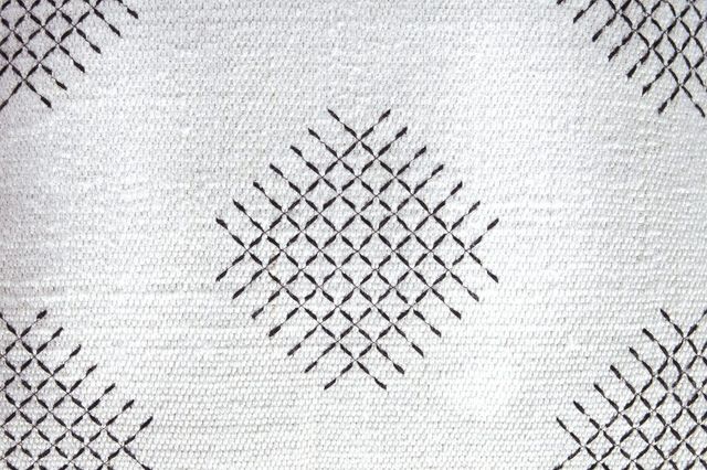 Signature Design by Ashley® Mabyn Ivory/Black Pouf-3