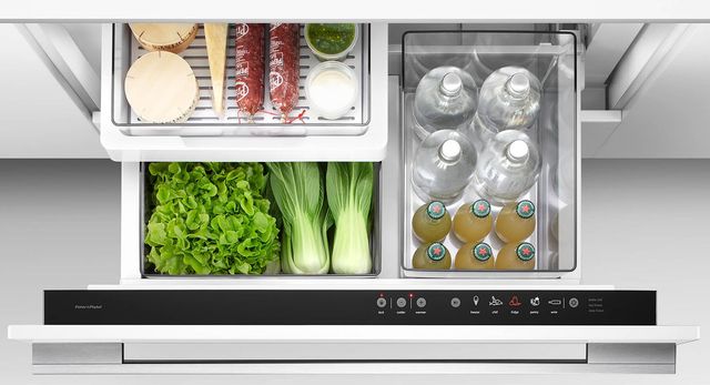 Open drawer refrigerator with food Open drawer refrigerator with food