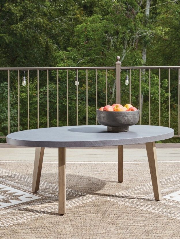 Signature Design by Ashley® Francis Beach Gray Aluminum Outdoor Oval Cocktail Table with Natural Base-1