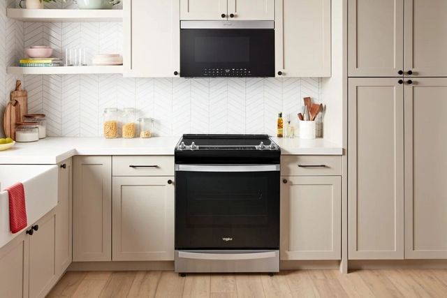 Whirlpool® 1.1 Cu. Ft. Fingerprint Resistant Stainless Steel Over The Range Microwave-4