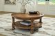 Signature Design by Ashley® Chadworth Medium Brown Round Cocktail Table-1