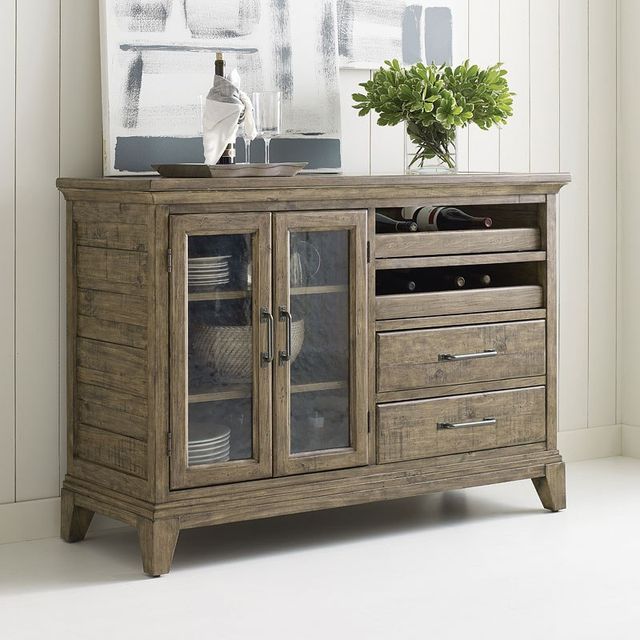 Front view of a modern home bar cabinet in a dining room 