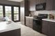 Whirlpool® 1.9 Cu. Ft. Over The Range Microwave Fingerprint Resistant Black Stainless Steel-2