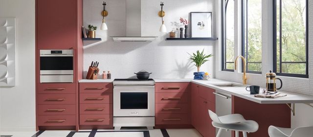 front view of a modern kitchen with a Wolf freestanding electric range
