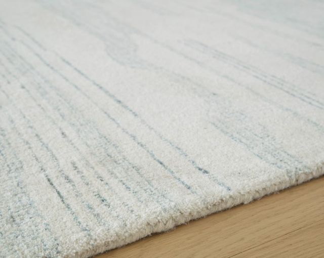 Signature Design by Ashley® Genemost Blue/Ivory 5'x7' Area Rug-2