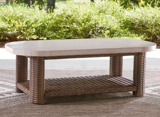 Signature Design by Ashley® Dolan Creek Beige Aluminum/Wicker Outdoor Rectangular Cocktail Table with Brown Base-1